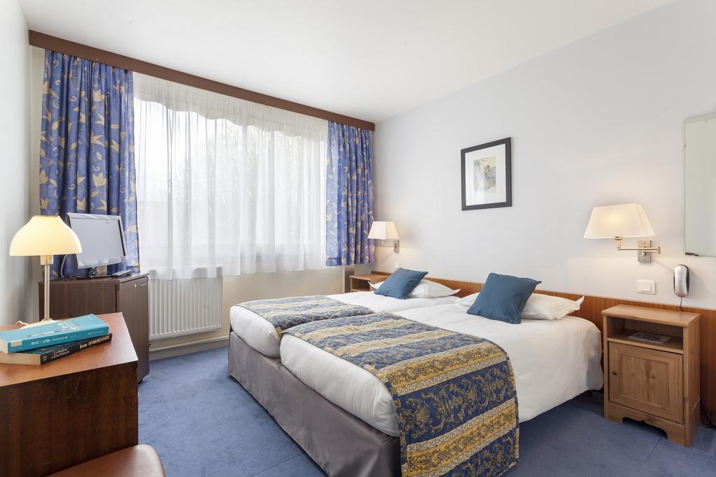 Aerotel Versailles Saint Cyr - L'Etape Du Silence Zimmer foto